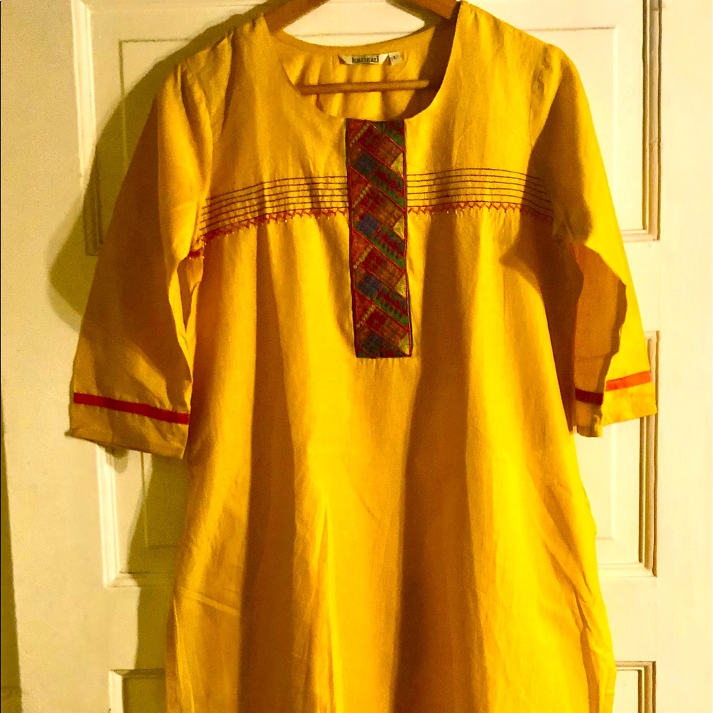 Yellow tunic with textile and bead detail